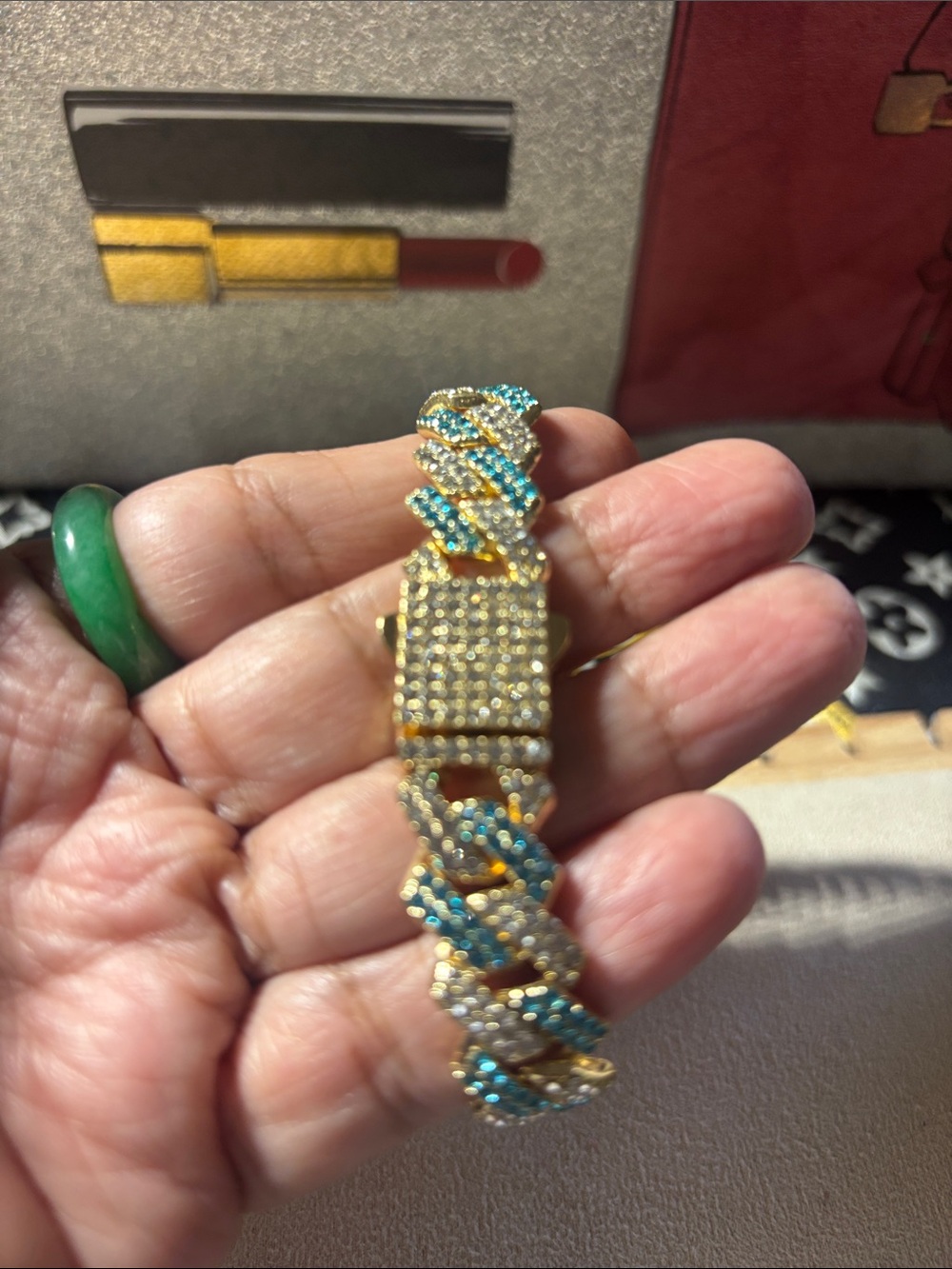 Gold-Tone Pavรฉ Cuban Link Bracelet with Blue and Clear Stones